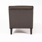 Chaise longue Hobart in similpelle bonded con design ergonomico ricurvo e gambe in legno di betulla
